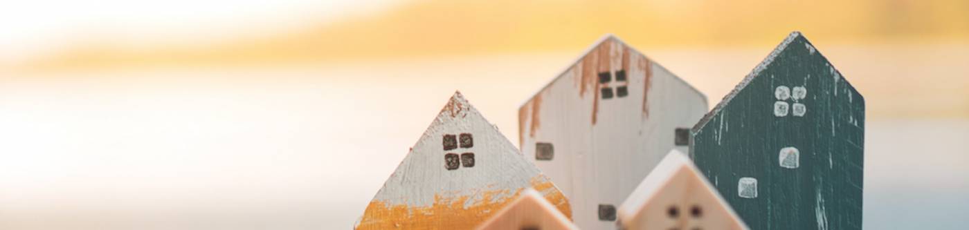 wooden block houses on beach