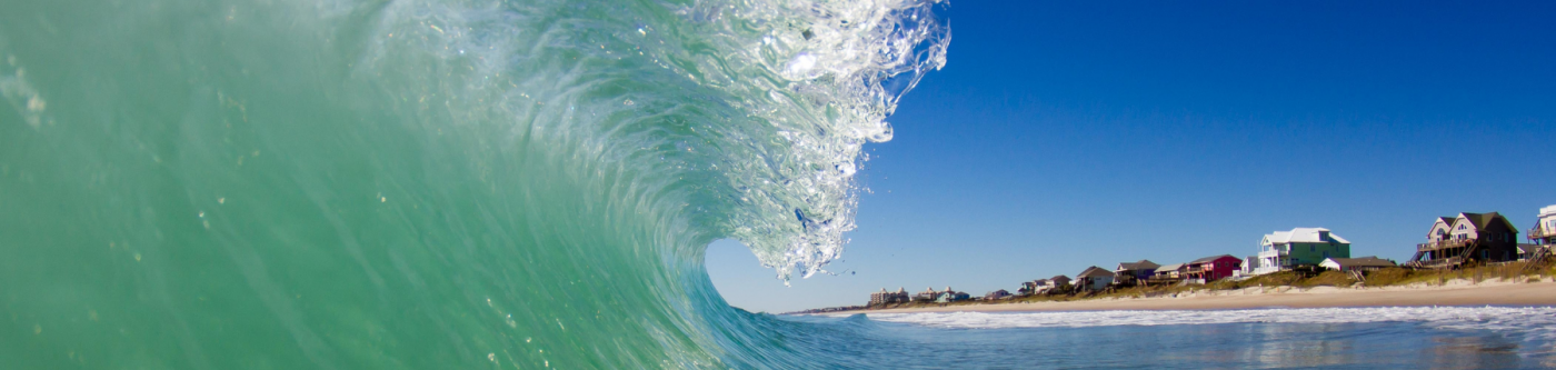 Light green wave along the shore in Emerald Isle, NC