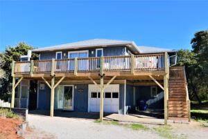 The exterior of an Emerald Isle vacation rental to relax in after exploring things to do in nearby Atlantic Beach, NC.