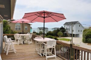 The patio of an Emerald Isle vacation rental to enjoy food from a local restaurant on.