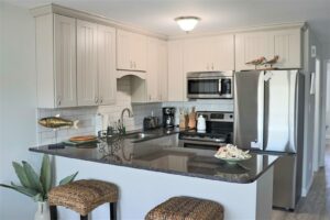 The kitchen of an Emerald Isle rental to make meals in on romantic North Carolina getaways.